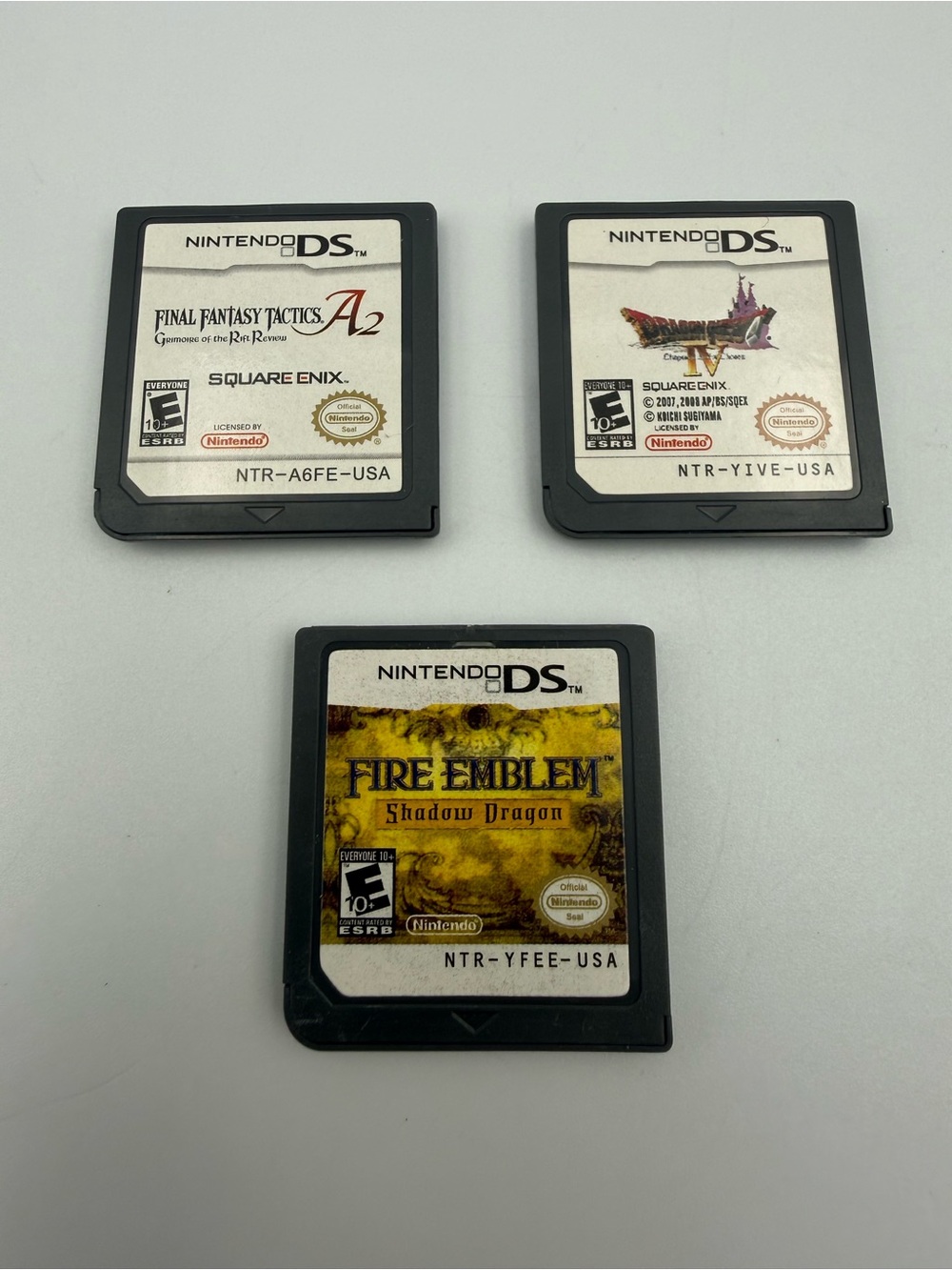 Fire Emblem Shadow Dragon + Dragon Quest IV + Final Fantasy Tactics A2 DS